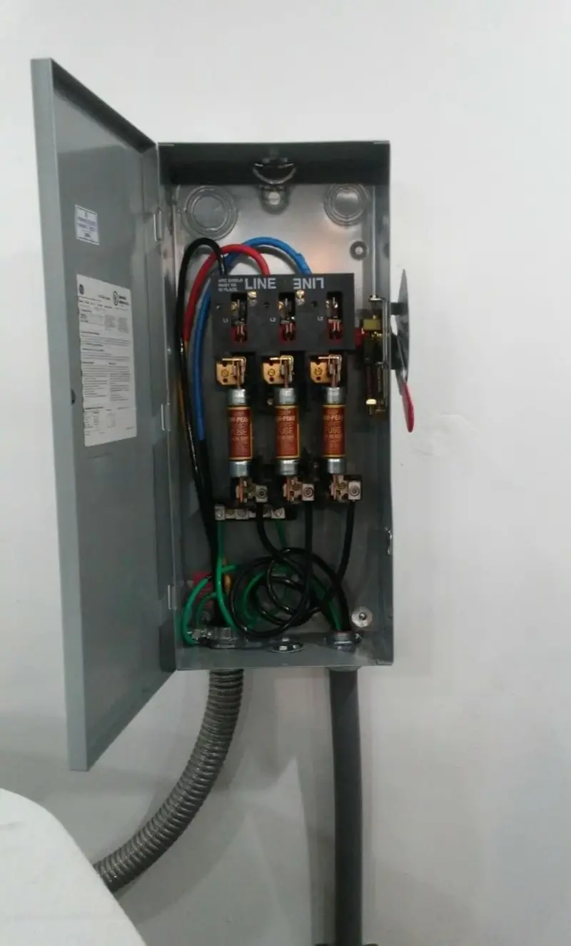 Three-phase disconnect switch installed for Smoke Detector Installation in Satellite Beach